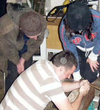 Loughie, Douglas and Marianne working on a block.